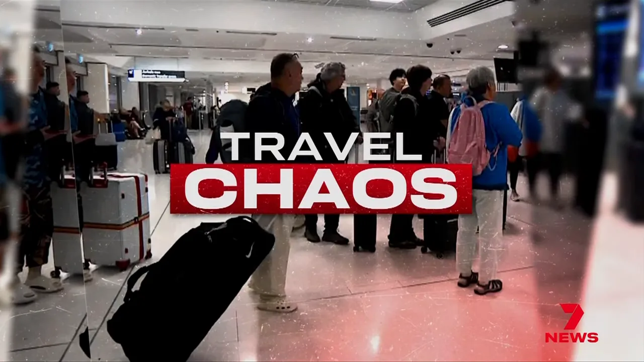 Crowd of passengers and luggage in an airport terminal with a prominent 'TRAVEL CHAOS' news graphic across the image.
