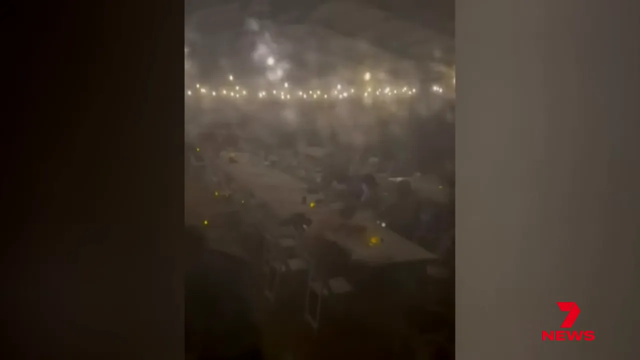 Wedding reception tent damaged and guests taking shelter