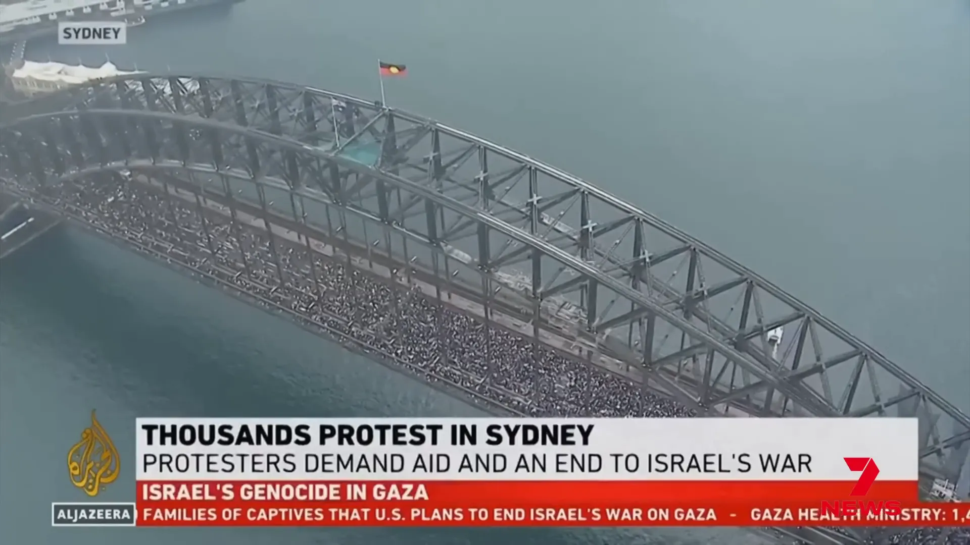 Crowds marching across Sydney Harbour Bridge