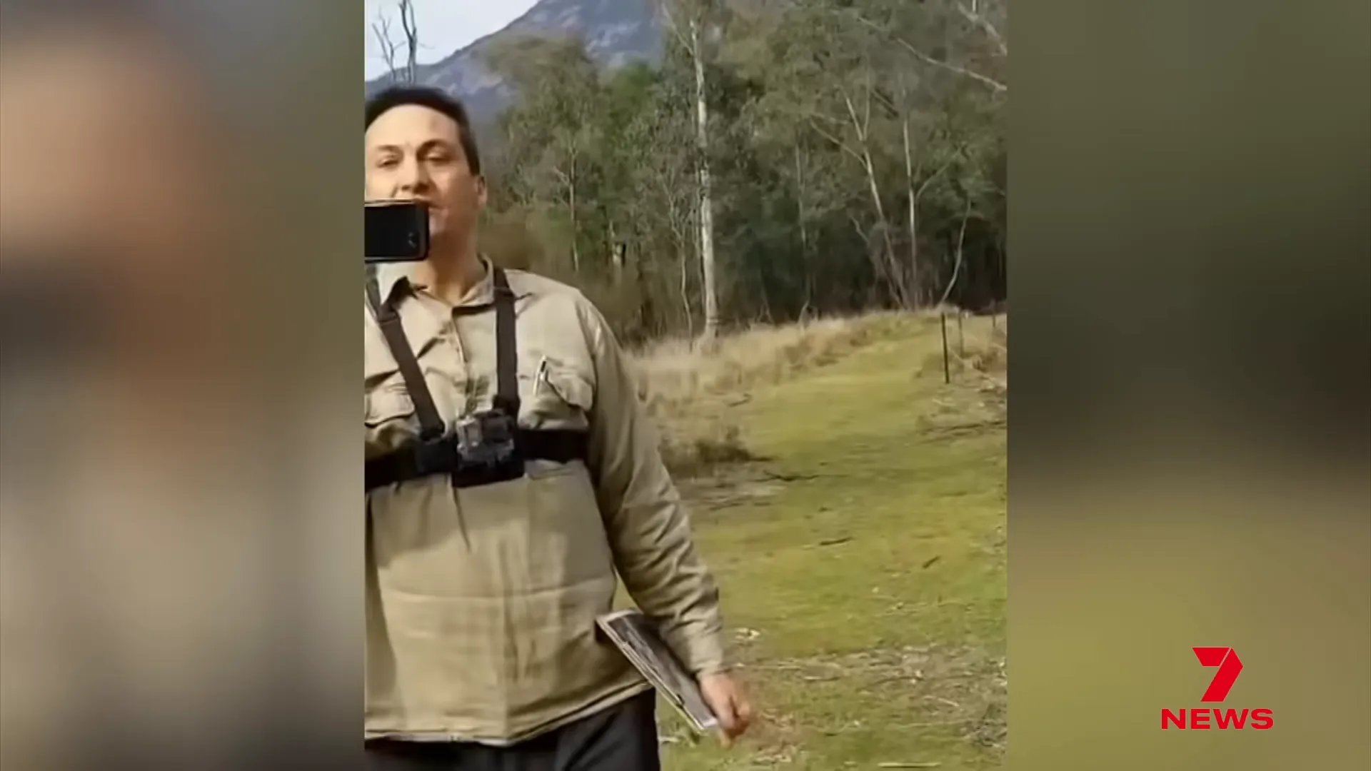 Police officers searching a rural property after a tip-off