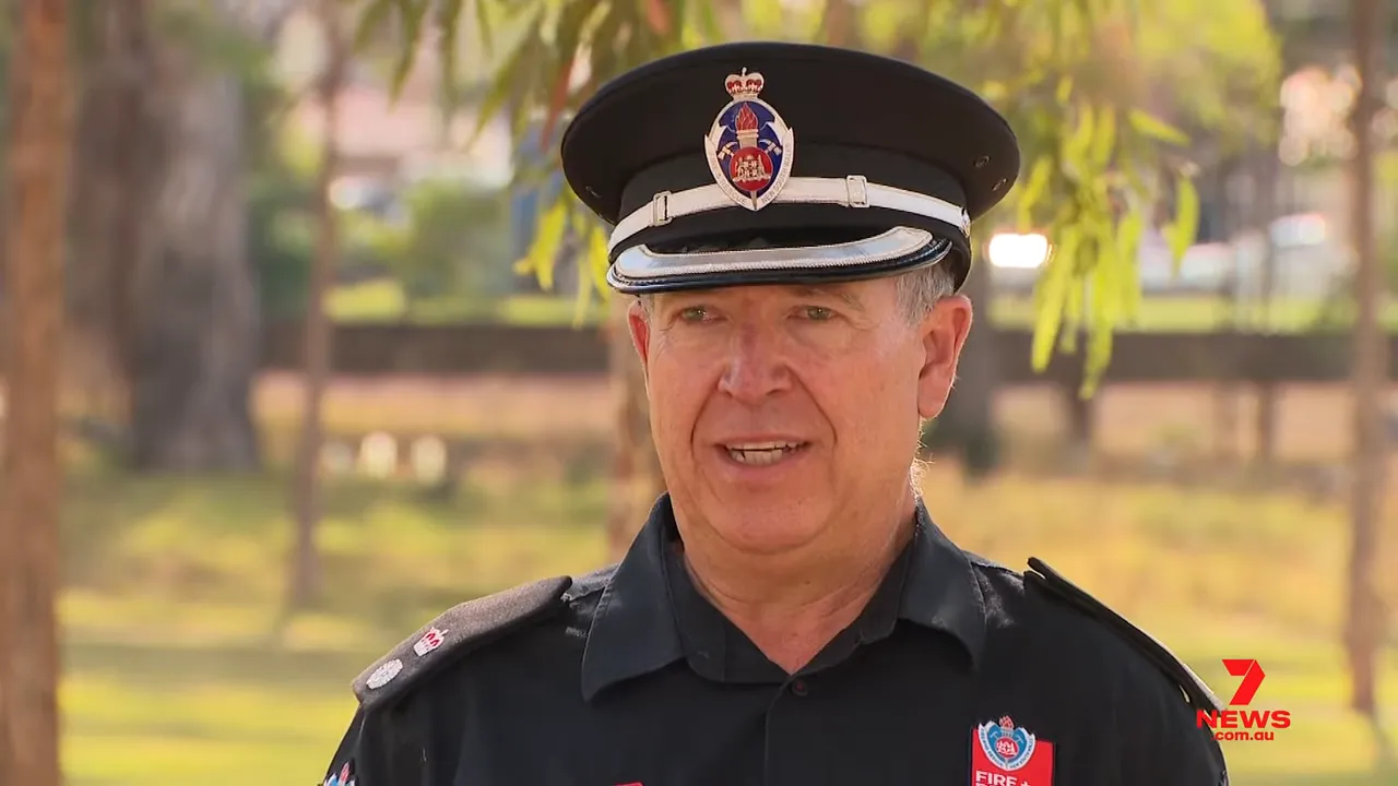 Fire service officer in uniform speaking about the M7 crash and response