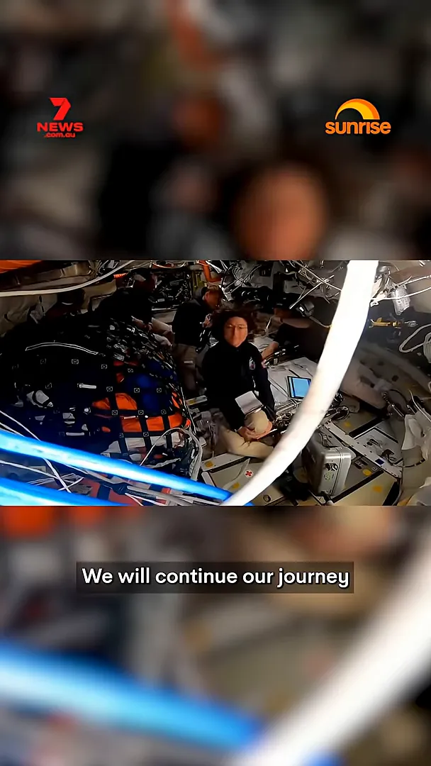 Artemis II crew inside spacecraft during outbound flight