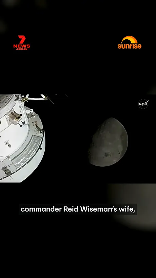 Lunar flyby view with text referencing Mission Commander Reid Wiseman's wife and the proposed name 'Carol'