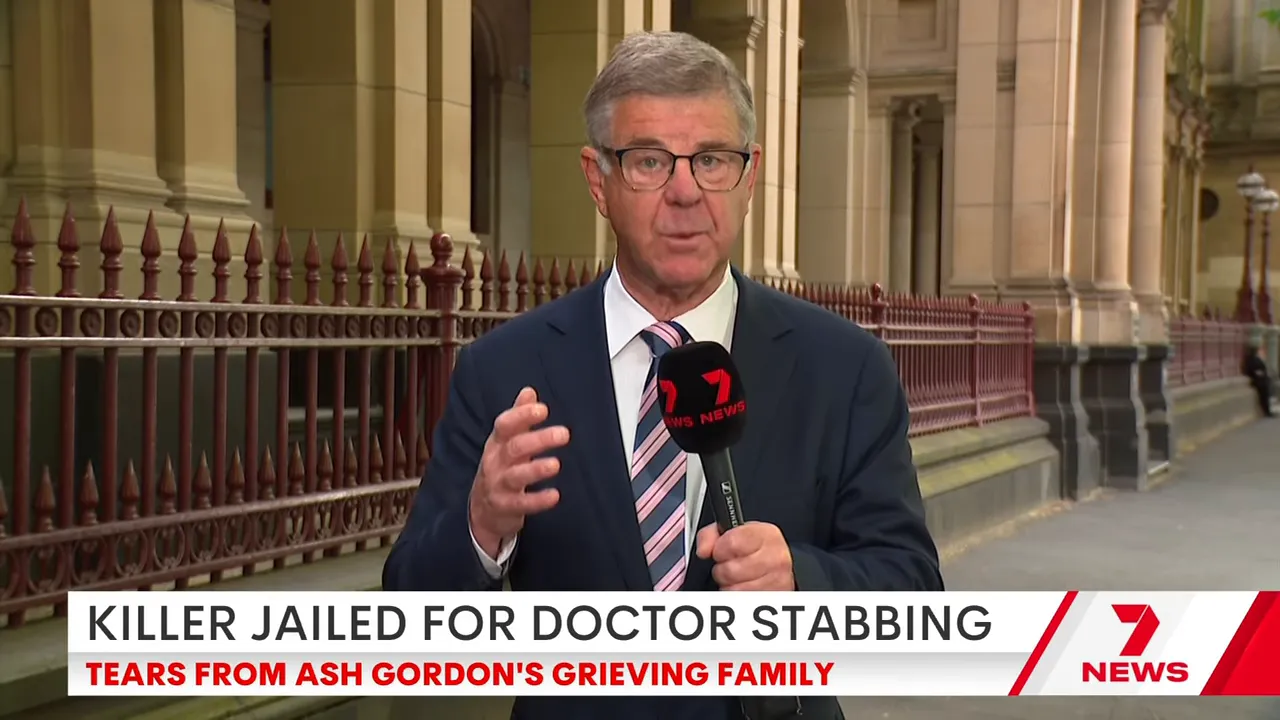 Television reporter on location outside the court with a headline banner about the sentencing visible at the bottom of the frame.