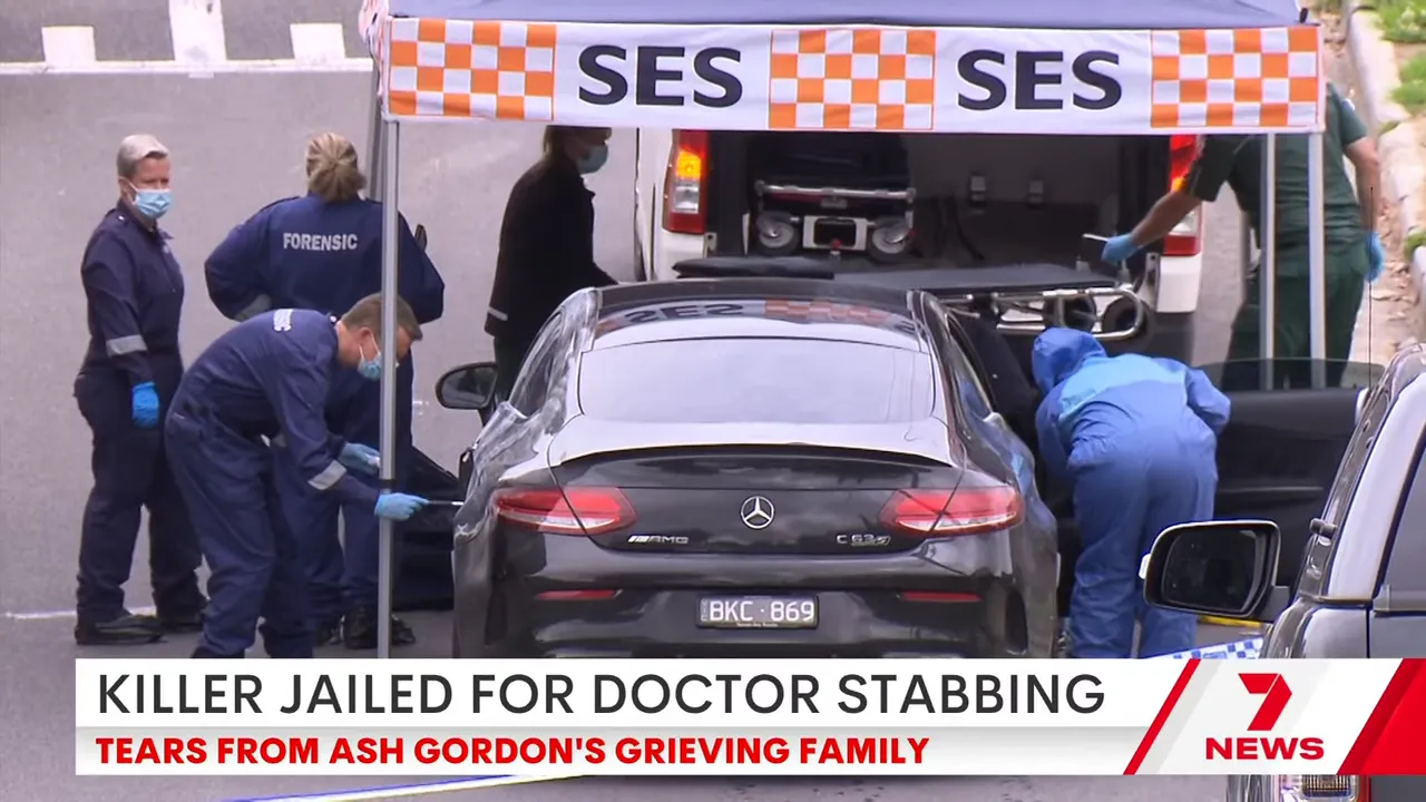 Forensic officers working under an SES tent beside a black Mercedes during a crime-scene investigation
