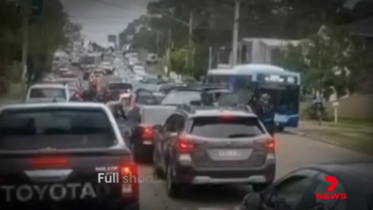 Graphic caption reading 'Full shootout if the cops!' in news footage