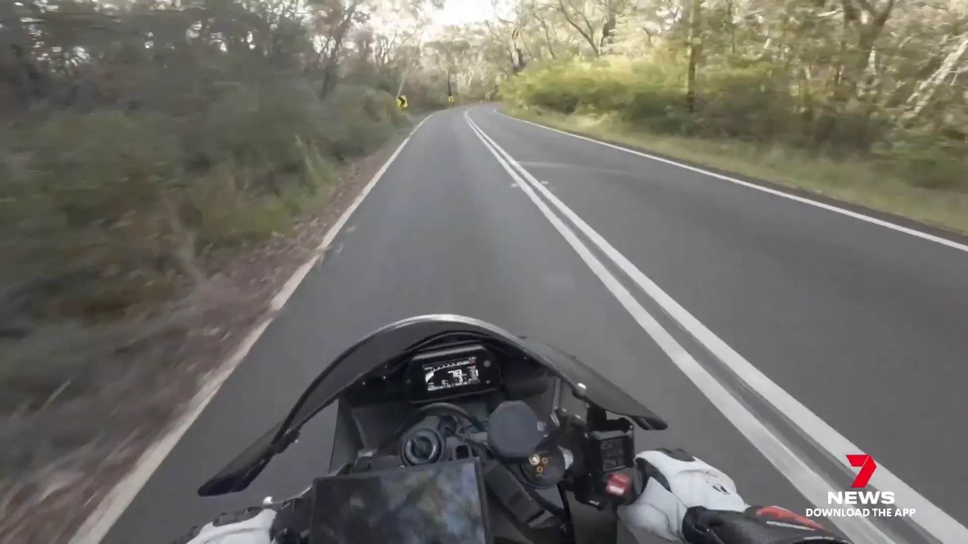 Helmet camera footage showing high-speed motorcycle ride