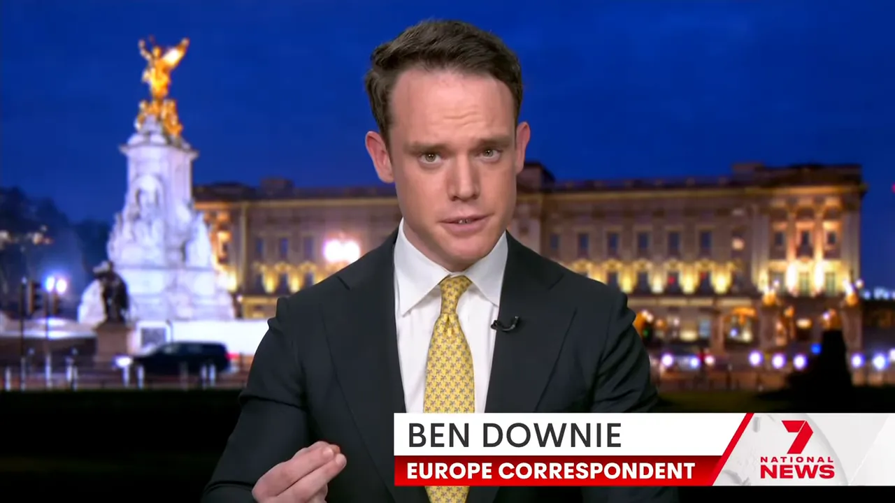 Europe correspondent reporting live outside Buckingham Palace at night with palace lights behind