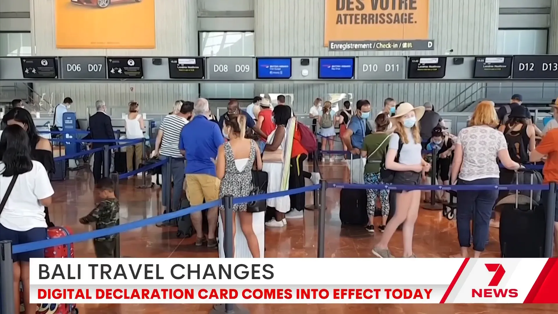 Passengers completing the new All Indonesia digital declaration card