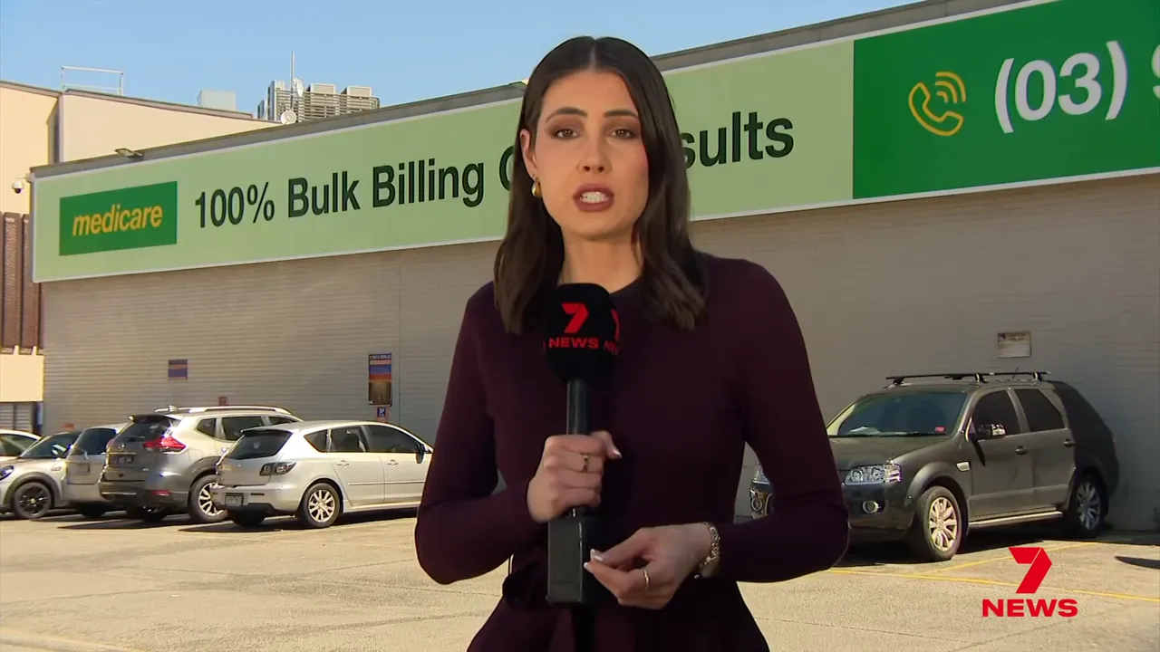 Patients waiting outside a GP clinic