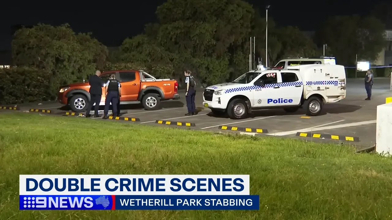 Police at a crime scene after a stabbing on Elizabeth Street