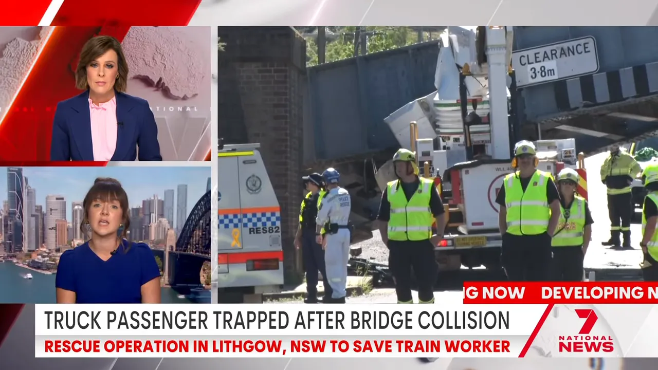 Emergency services working at the scene to free the trapped passenger