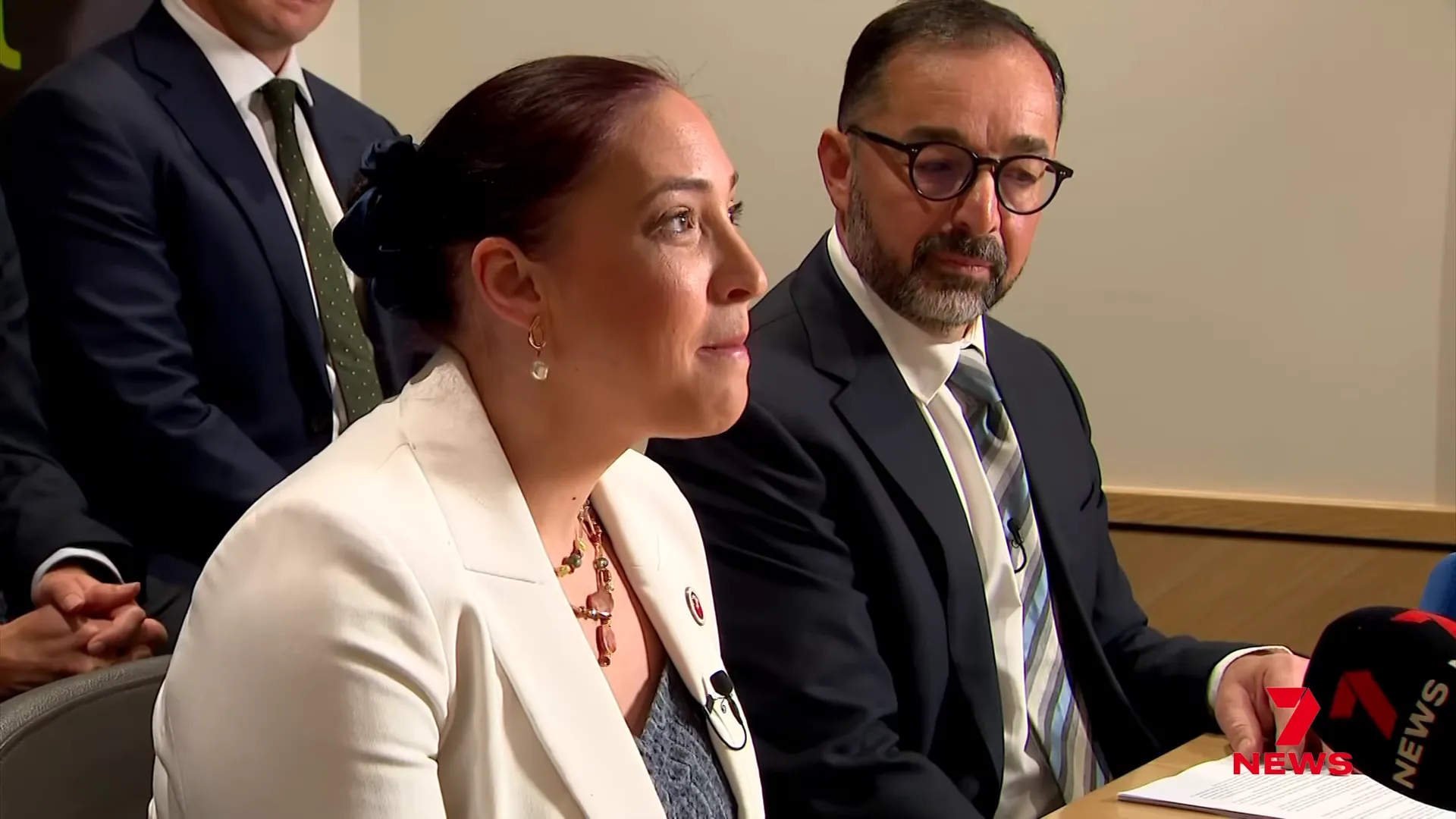 Reporters and affected people responding to the settlement announcement