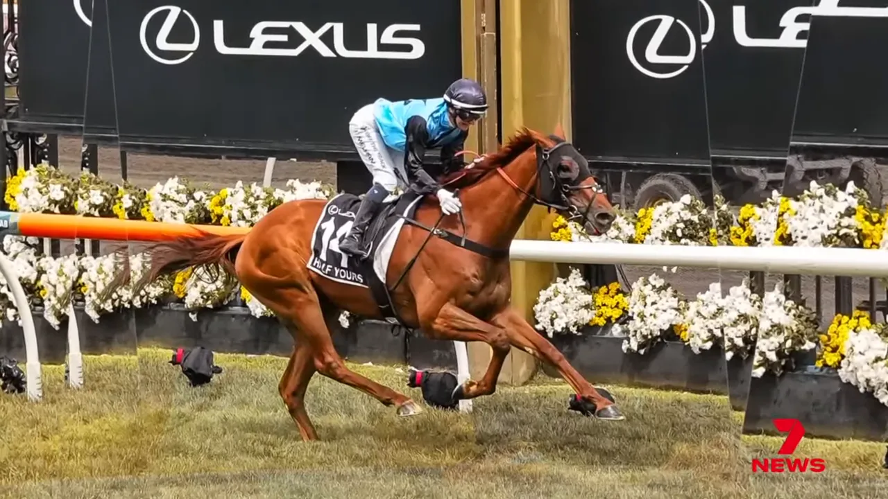 Jamie Melham on Half Yours crossing the finish line