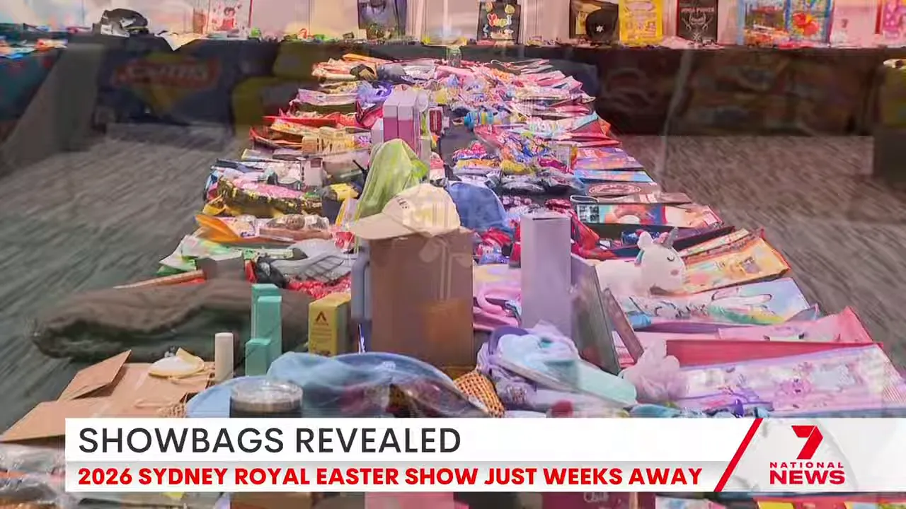 Long table filled with many opened showbags and their contents lined up for display