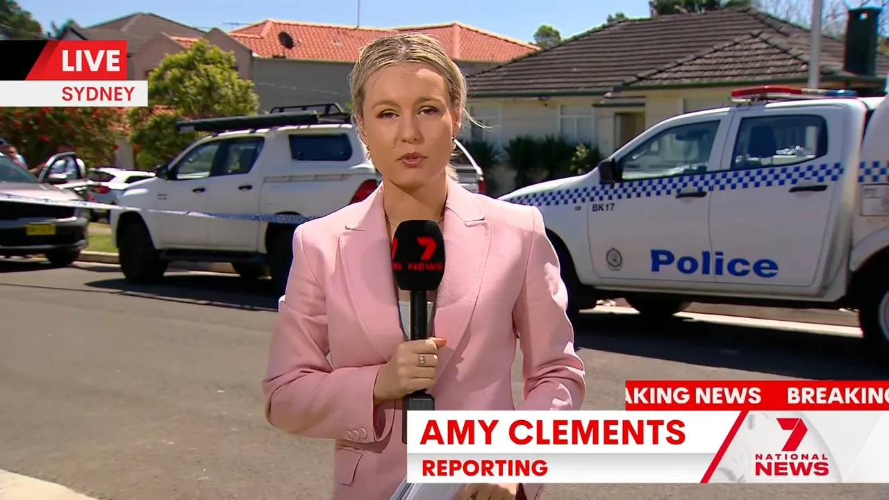 Reporter on Wollongbar Avenue describing the police operation