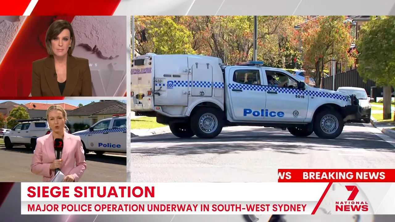 Bearcat armoured vehicle and tactical police positioned near the property