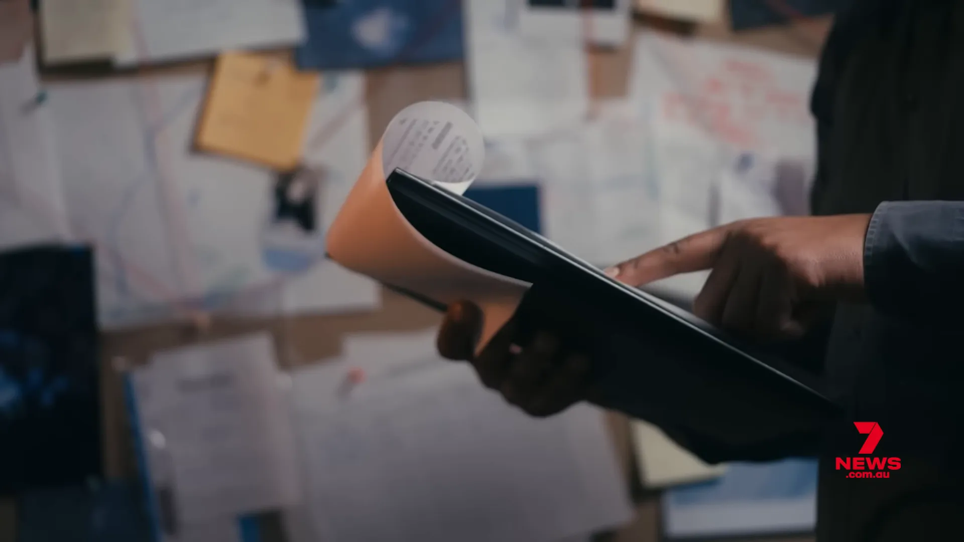 Detective and officers at a property search