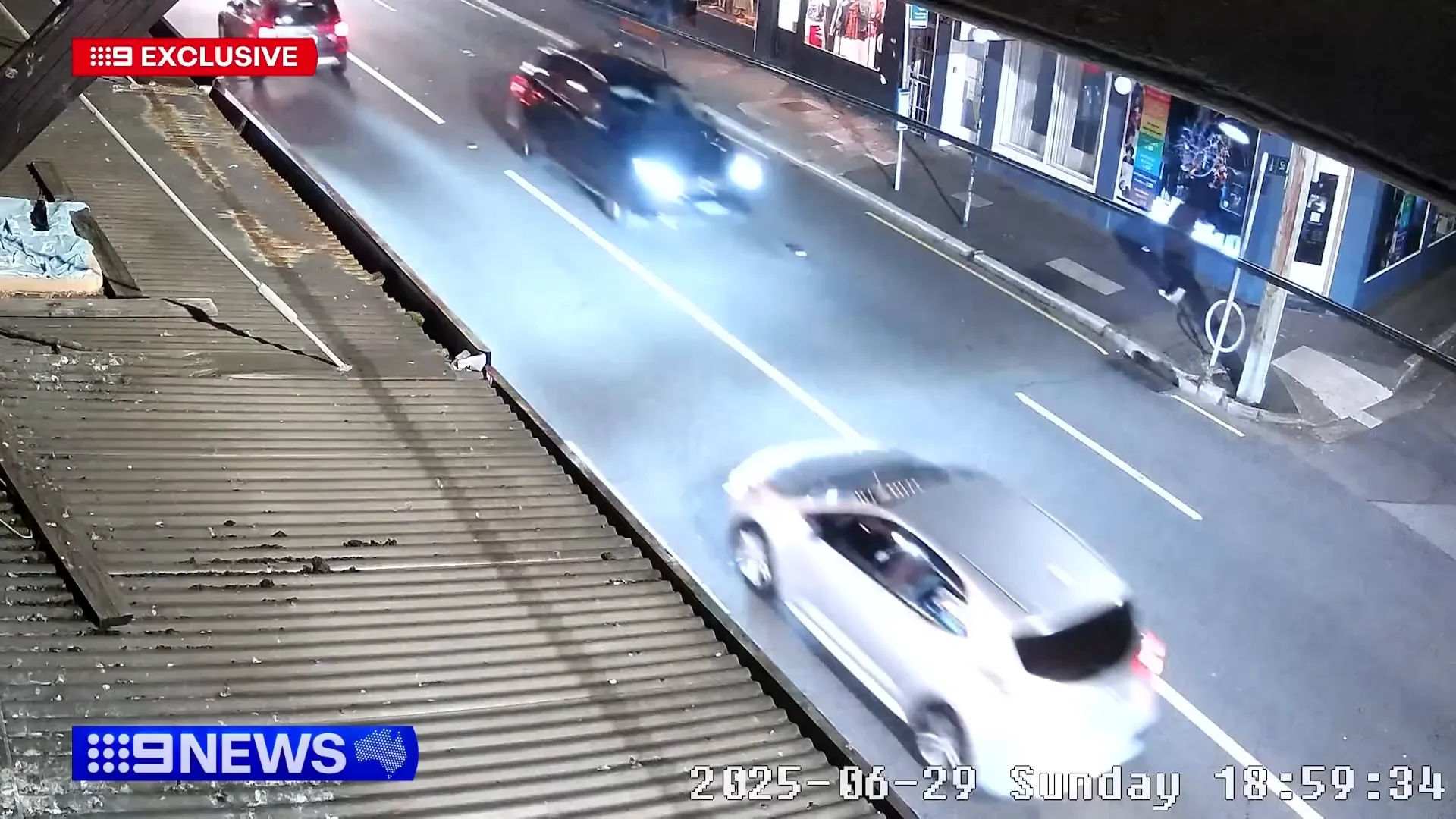 SUV speeding down King Street on the wrong side of the road