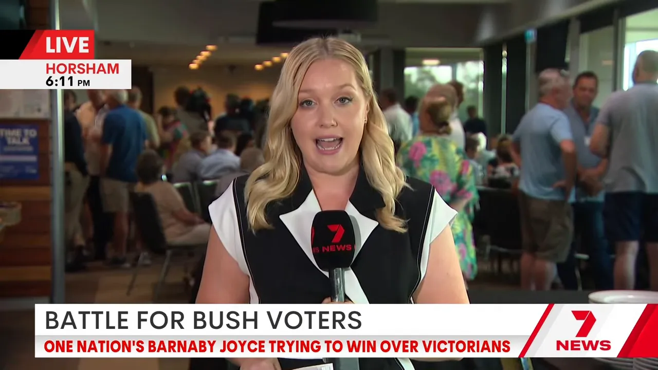 Seven News reporter on location in Horsham with a crowd of residents and event activity visible behind her