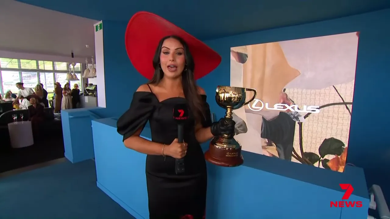 Guests admiring a bespoke gold accessory valued at $800,000