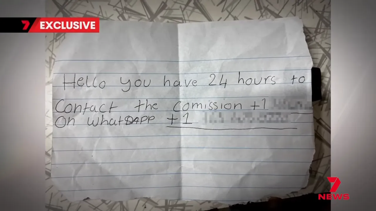 Ransom note attached to the shop's front door