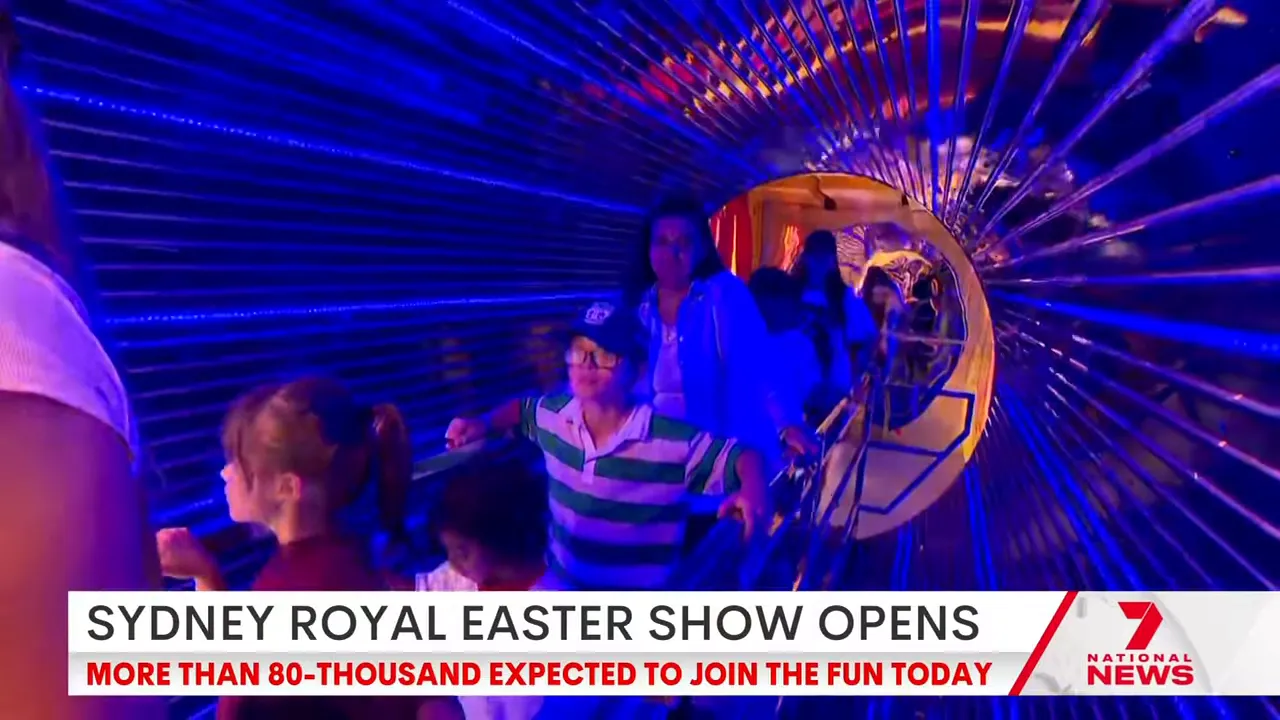 Enchanted Circus performers under blue neon lighting at the Royal Easter Show Sydney