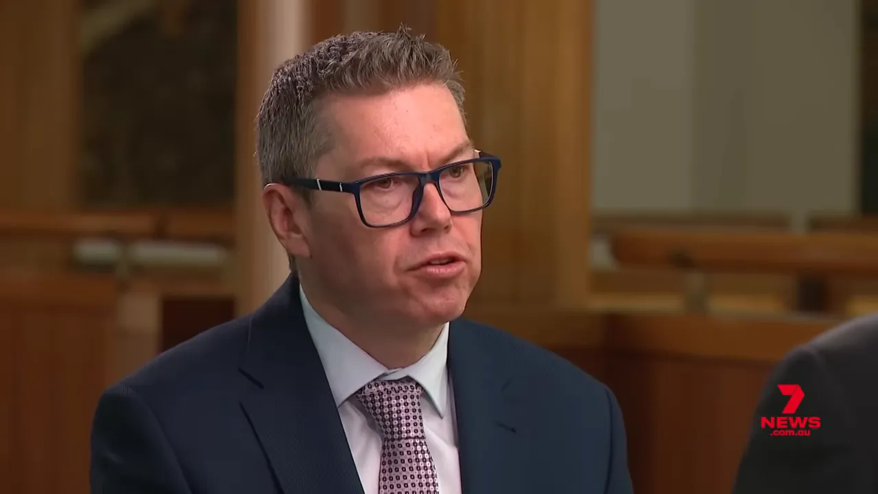 Pat Conroy speaking in a seated TV interview about Pacific recruitment and defence policy.