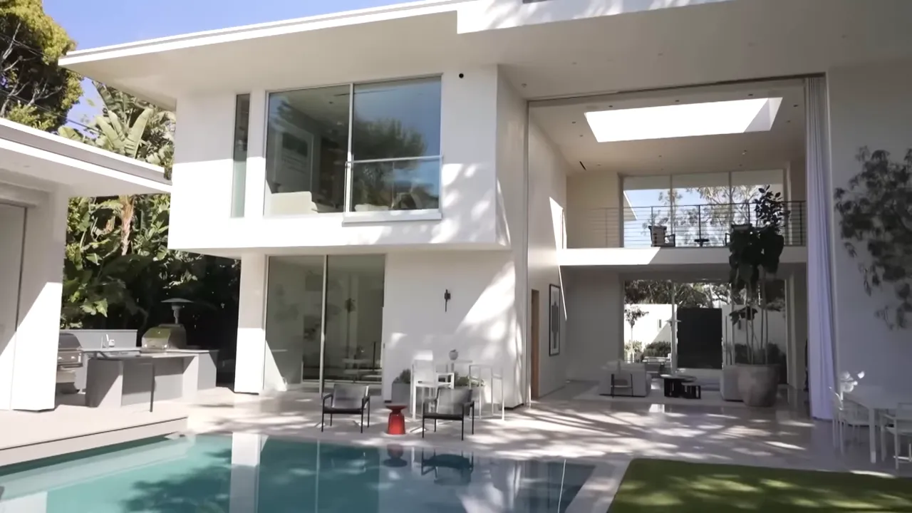 Interior of a million-dollar California mansion with terrace and garden view