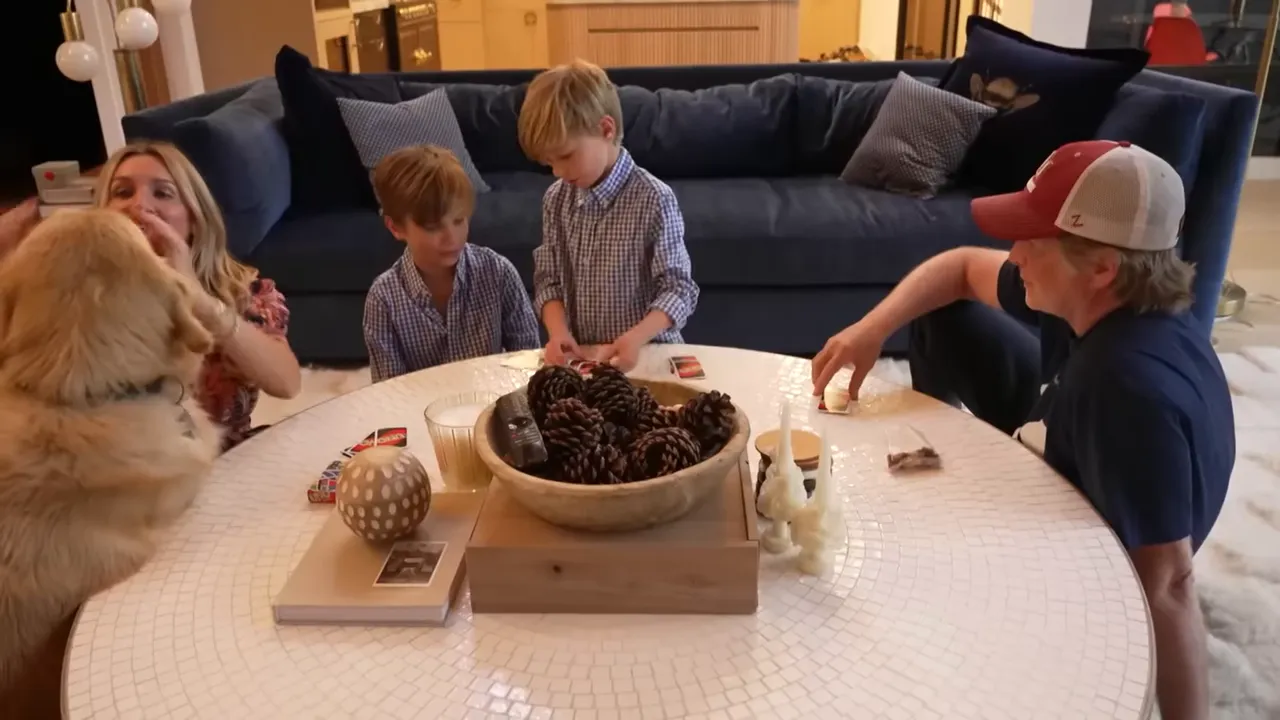 Shelton and her family on the beach, lacrosse game in the background
