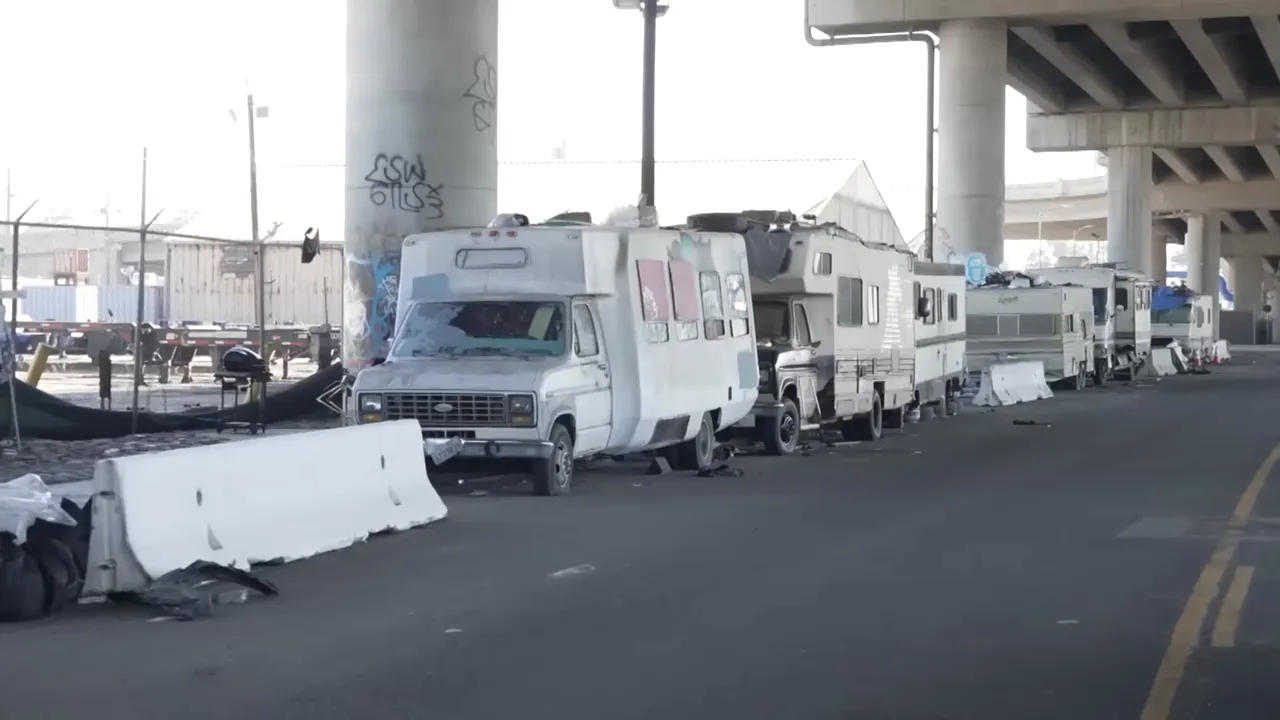 Caravans and camper vans lining city streets