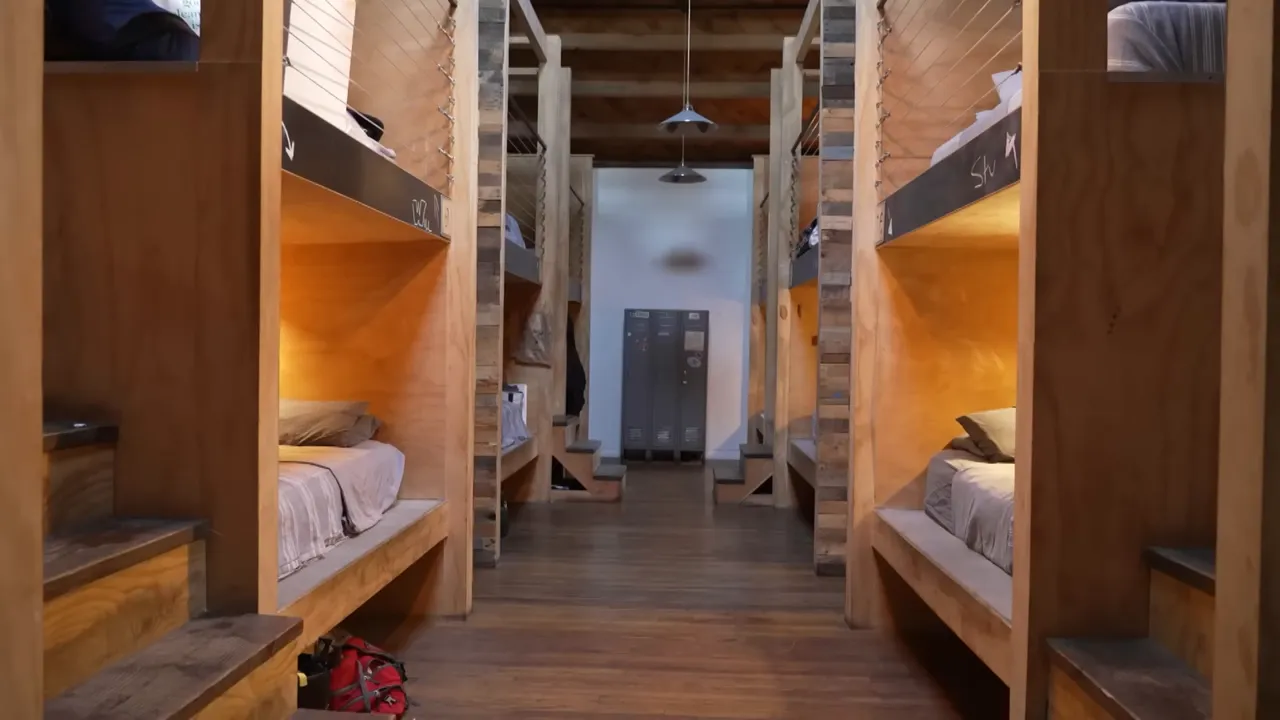 Interior of a Podshare communal kitchen and bunk beds