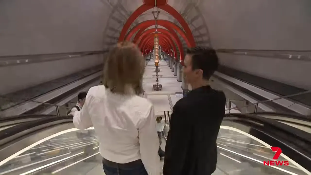 Long view down the station platform showing depth and scale