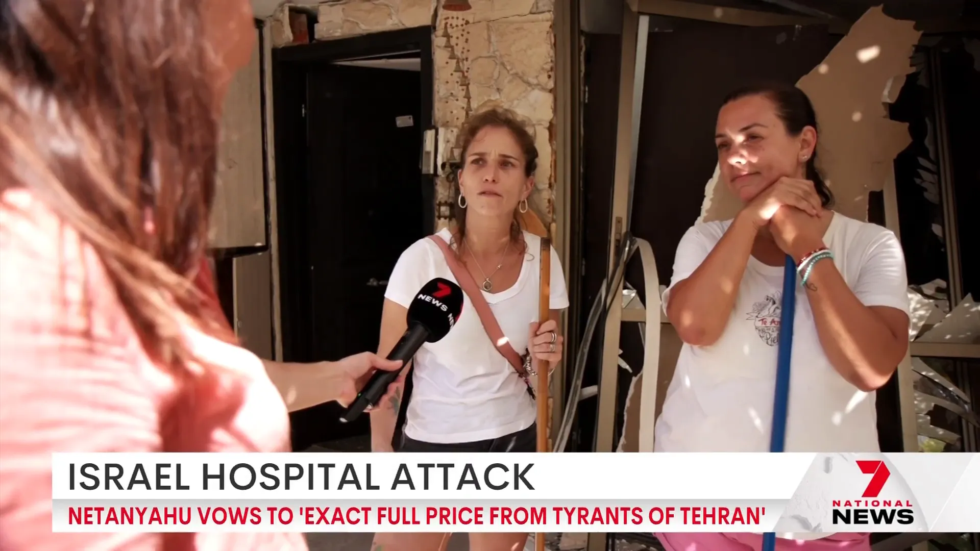 Local residents reacting to missile attack in Holon