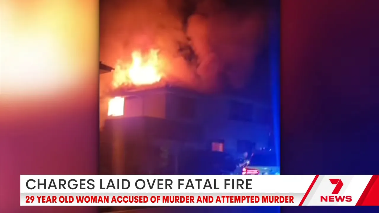 House on fire at night with flames coming from the upper floor during the Clyde North blaze