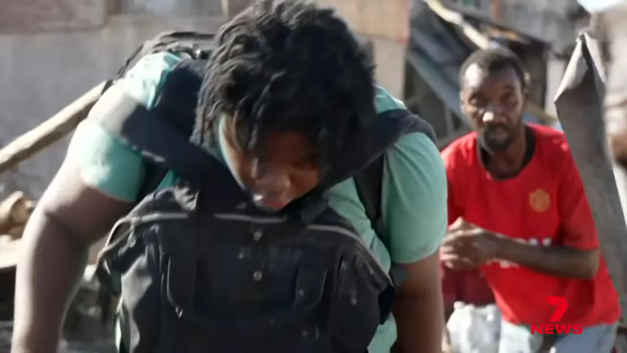 People searching through rubble for supplies