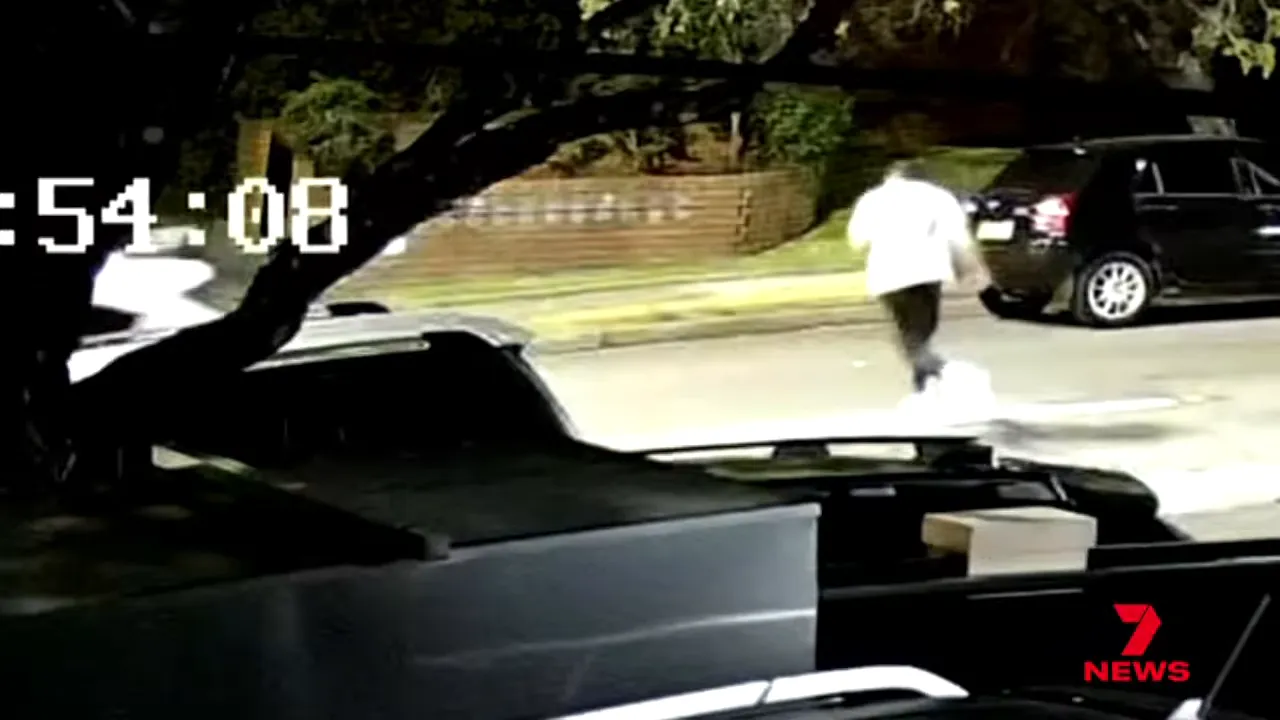 Timestamped CCTV footage of a vehicle and a runner near homes during a Greenacre escape attempt