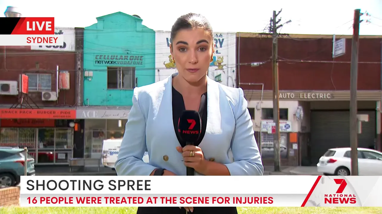 Bullet-damaged shopfront with holes visible