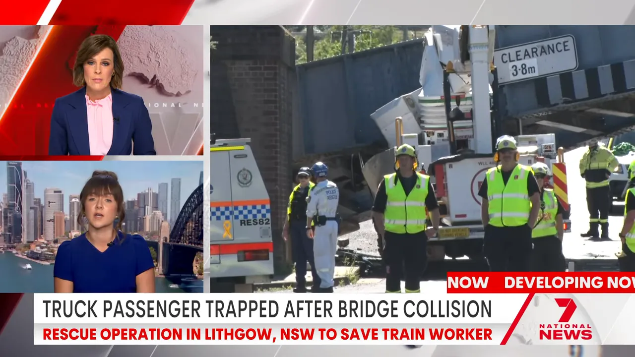 Cherry picker collapsed under a rail bridge after impact