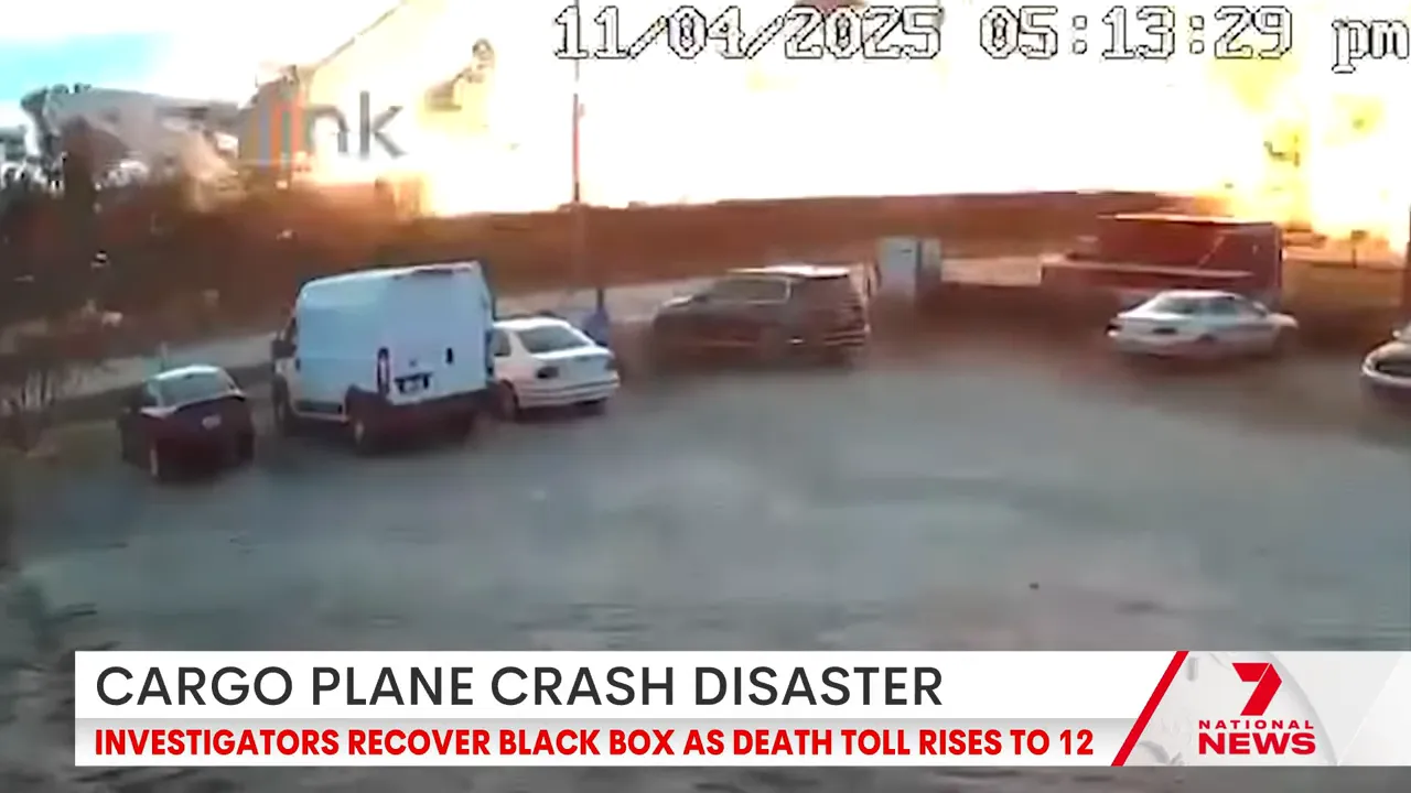 CCTV still showing plane's left engine separating from the wing