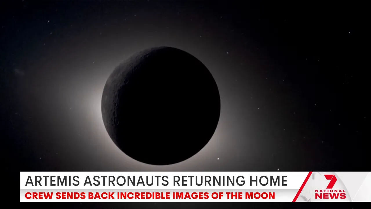 Artemis 2 return view showing the darkened eclipse disk and stars in space