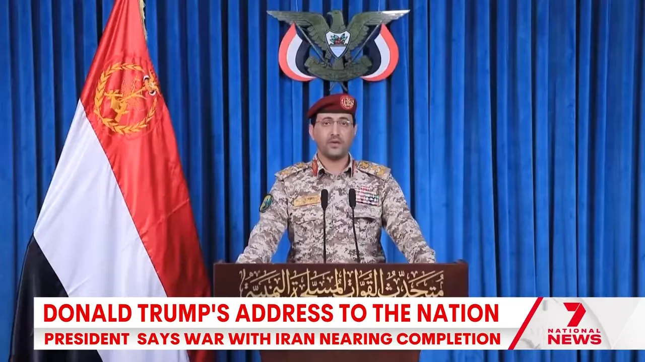 Iranian military official speaking at a podium during an official address