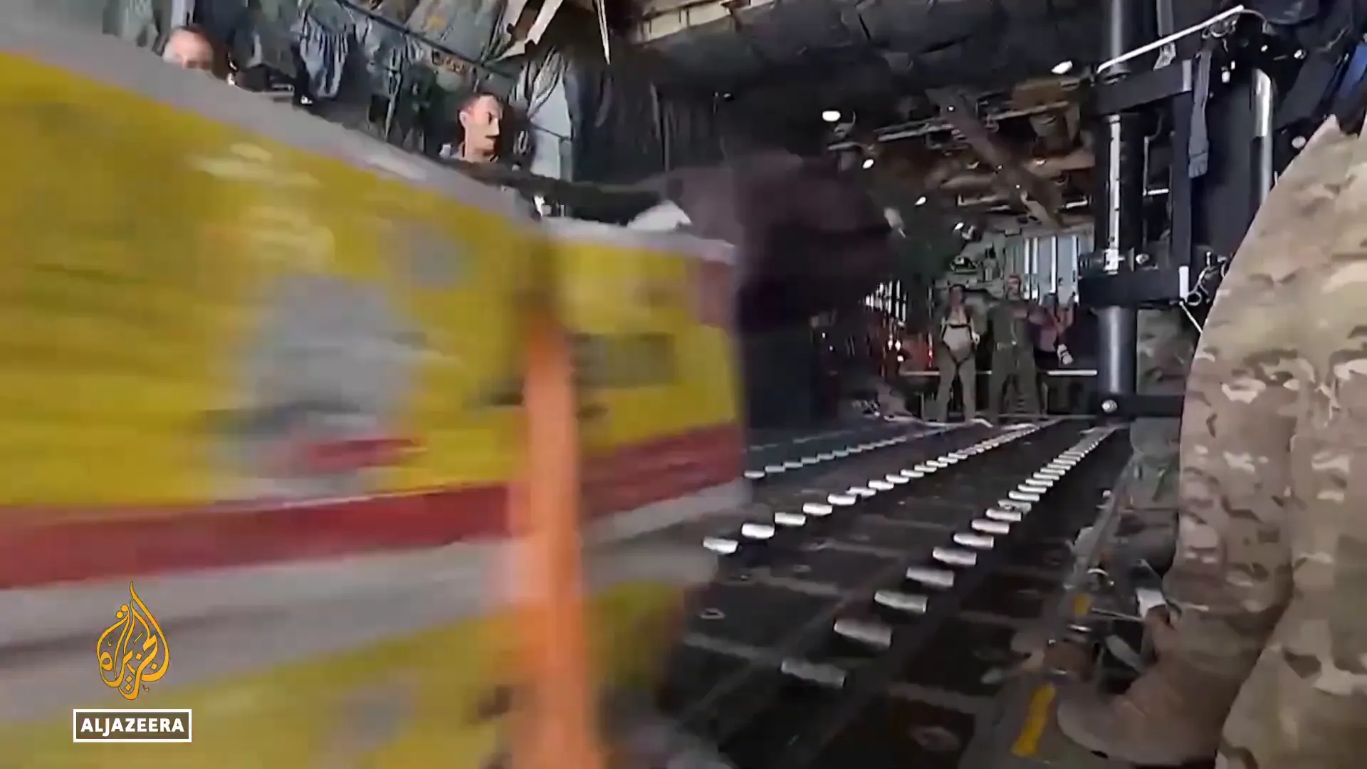 Aid workers unloading supplies in Gaza