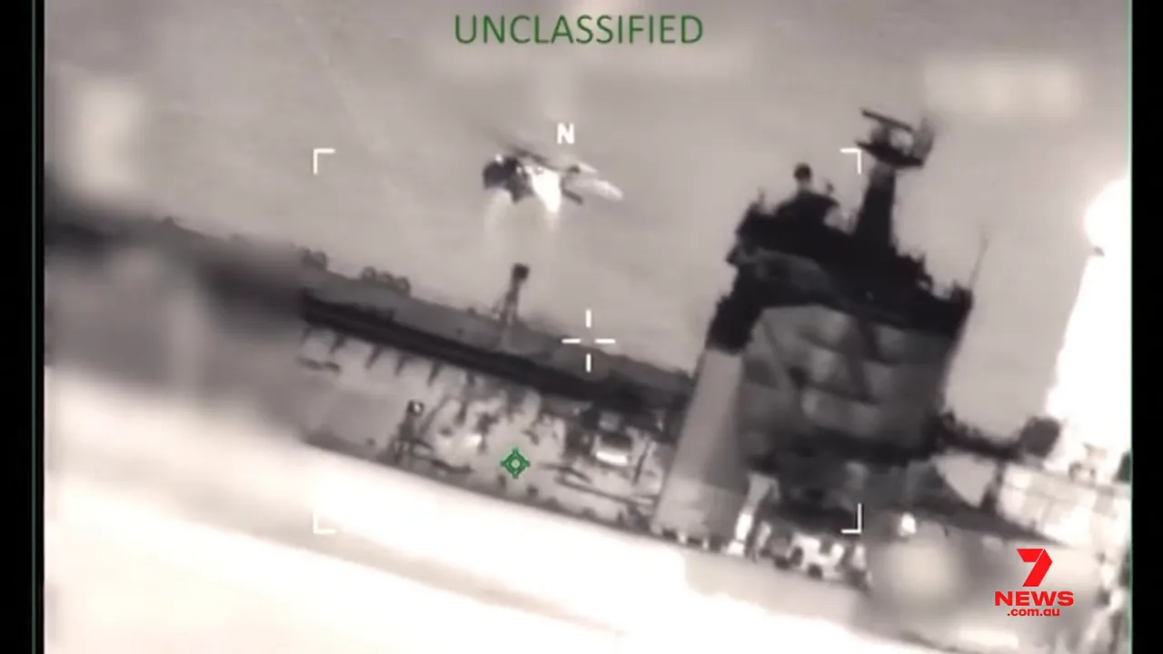 Aerial thermal surveillance image showing a large tanker’s superstructure with crosshair and UNCLASSIFIED label