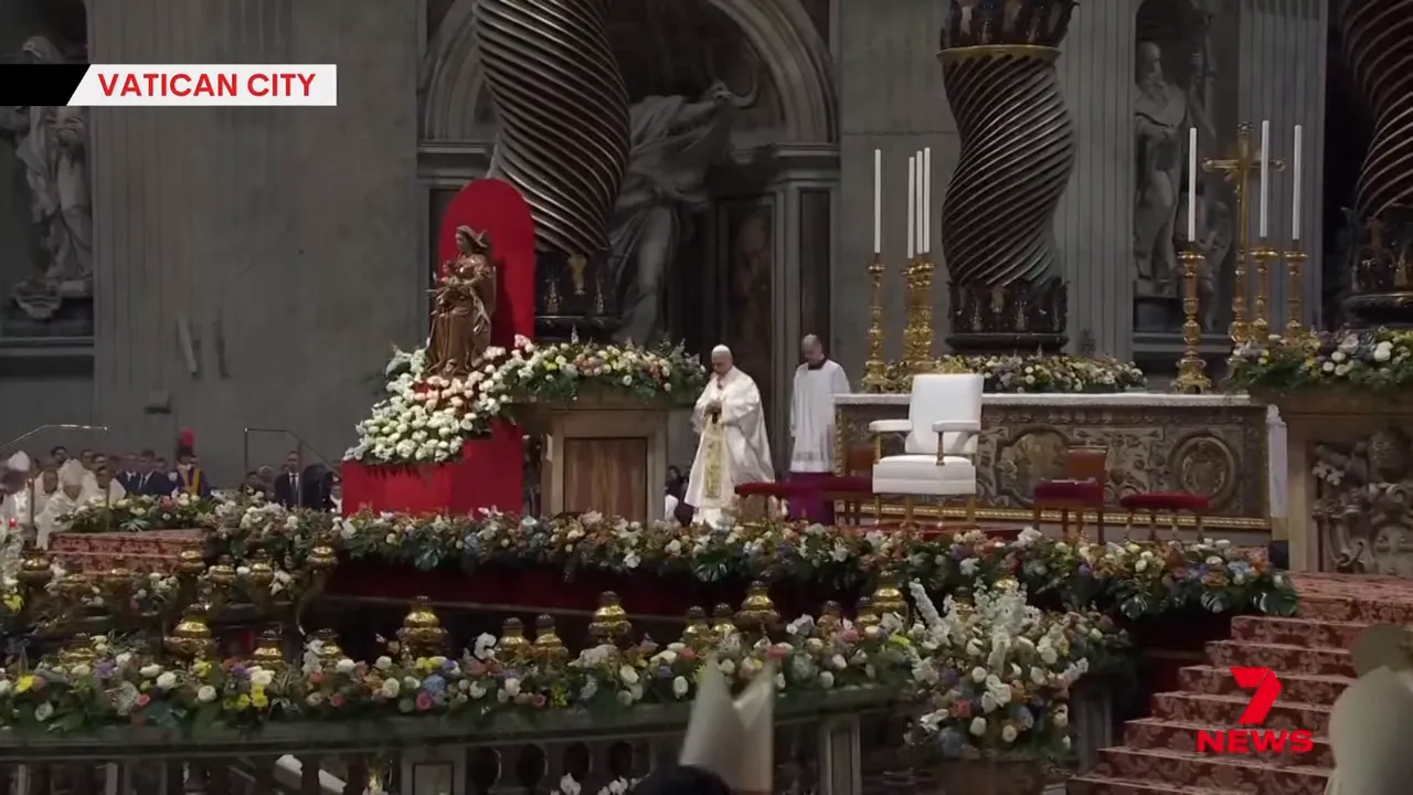 Pope Leo celebrating Easter Mass in Vatican City with floral arrangements and clergy on the altar