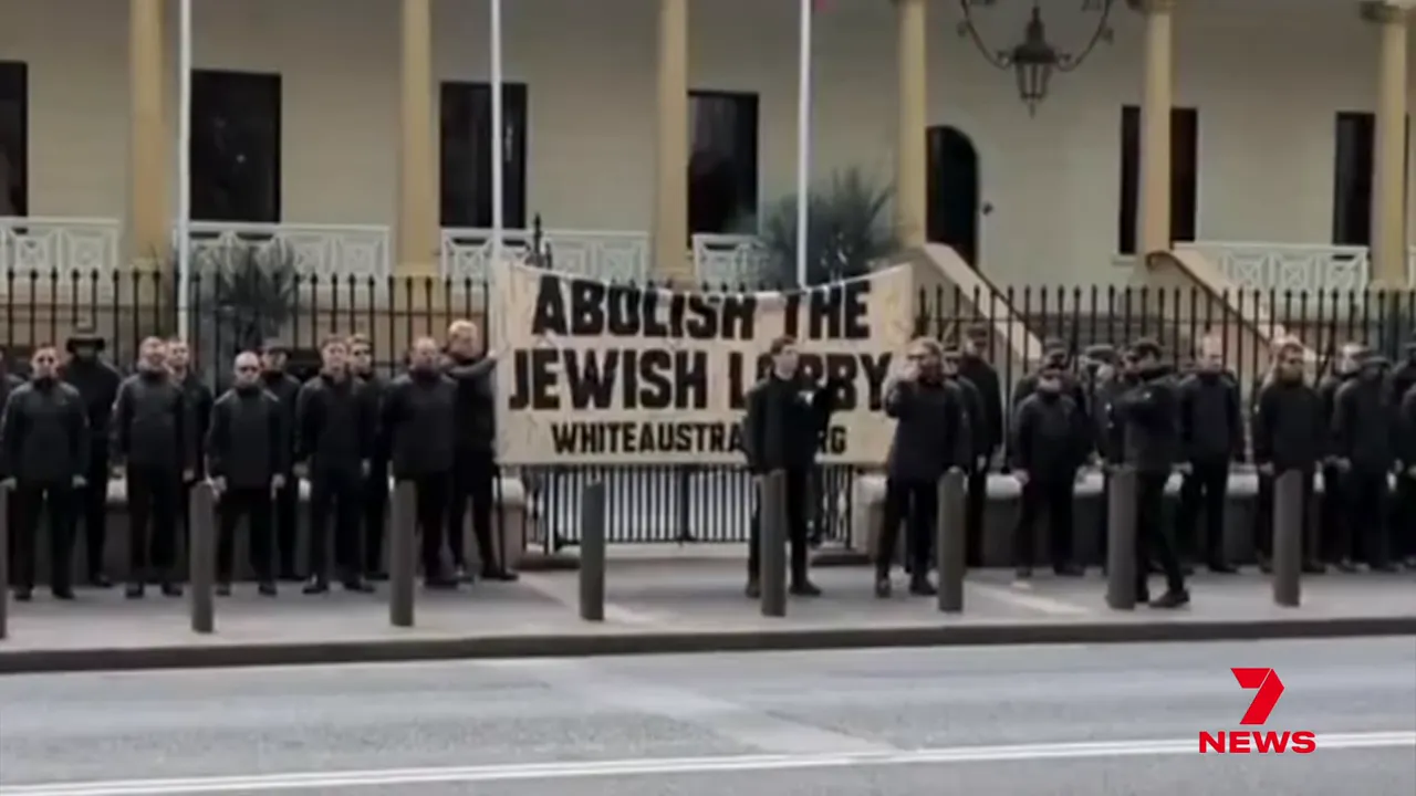 Protestors chanting against Jewish lobby groups and hate speech laws