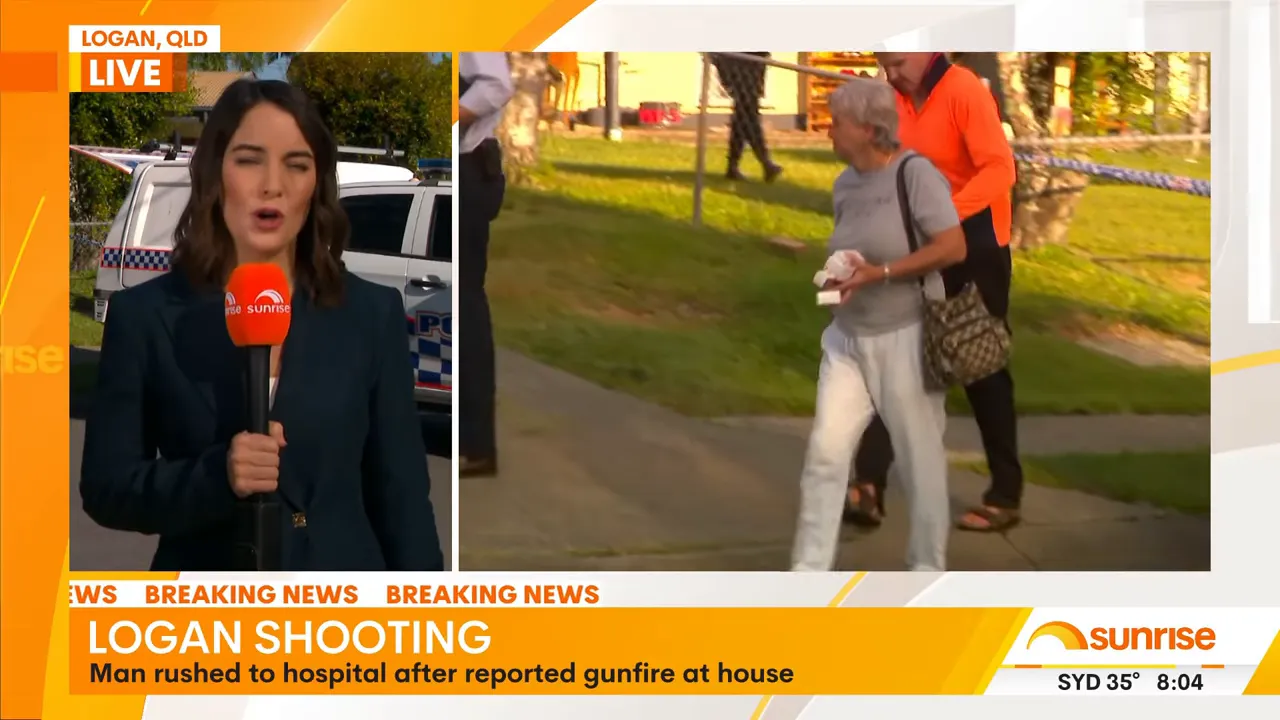 Woman being escorted from a Slacks Creek property near police tape and officers