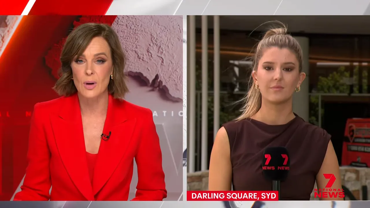Split-screen TV news shot showing a studio anchor and a remote reporter with a lower-third reading 'DARLING SQUARE, SYD'.