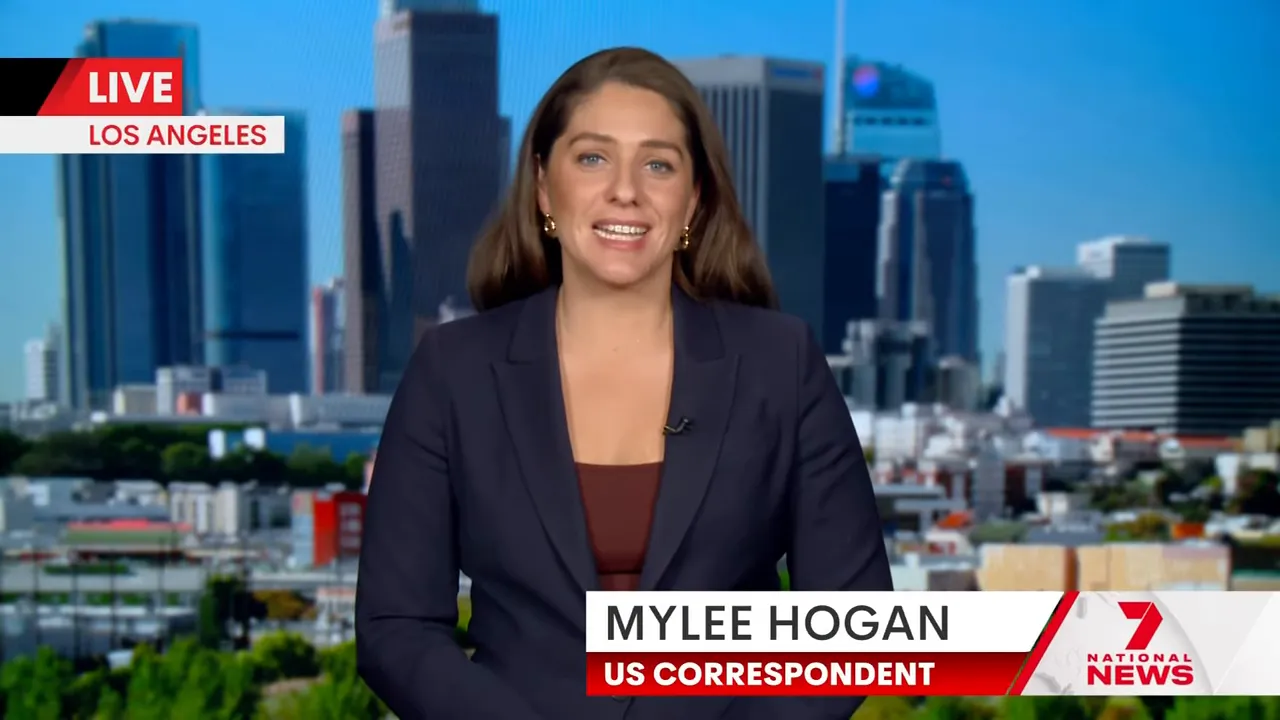 Los Angeles television correspondent reporting live with the city skyline behind her and a 'LIVE / LOS ANGELES' lower-third.