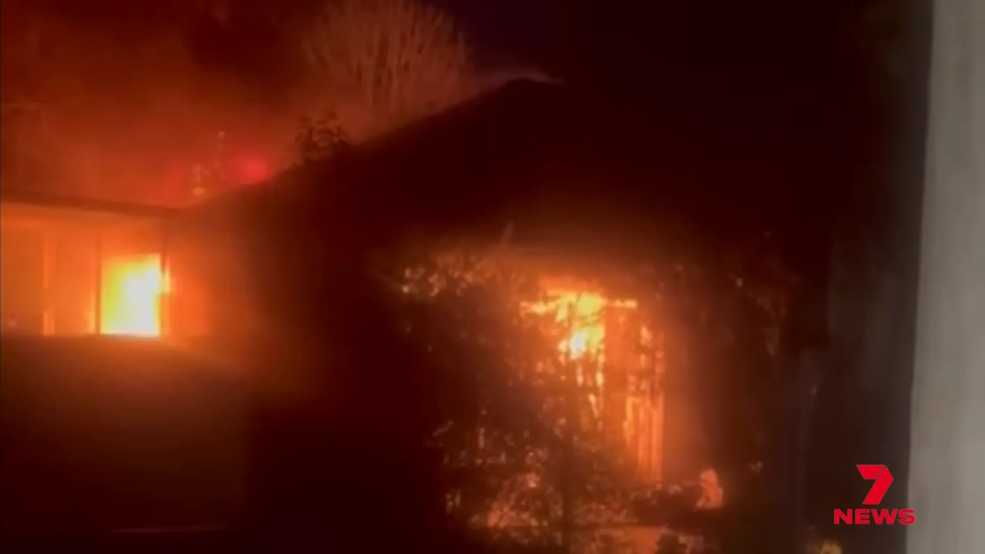 Smoke and flames from the torched home